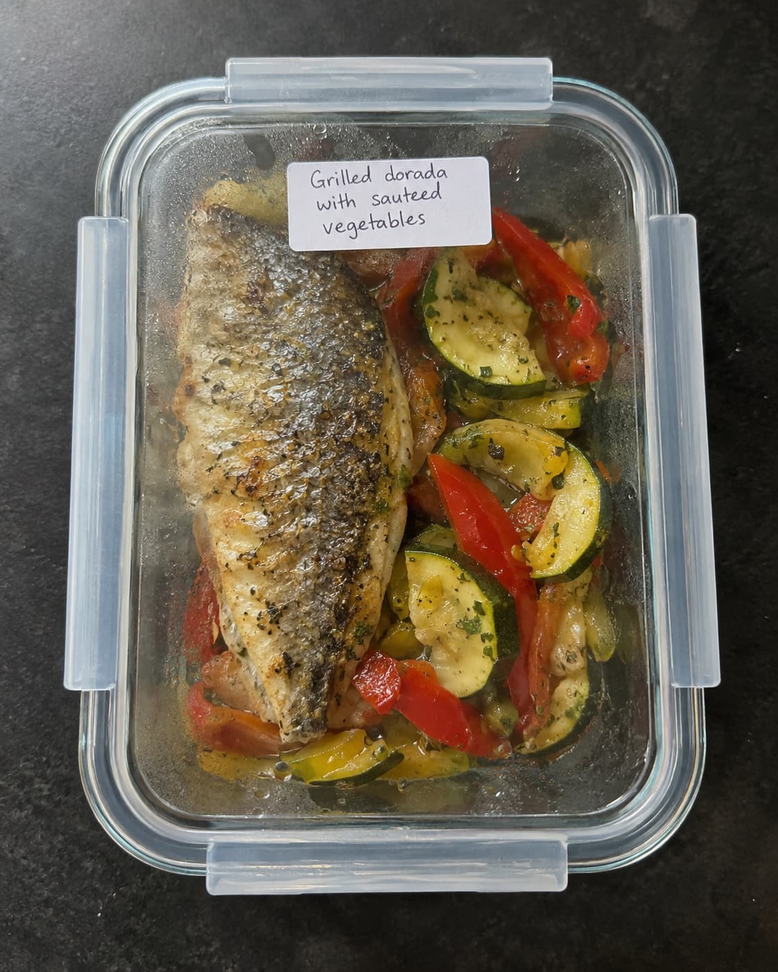 Grilled dorada with sauteed vegetables