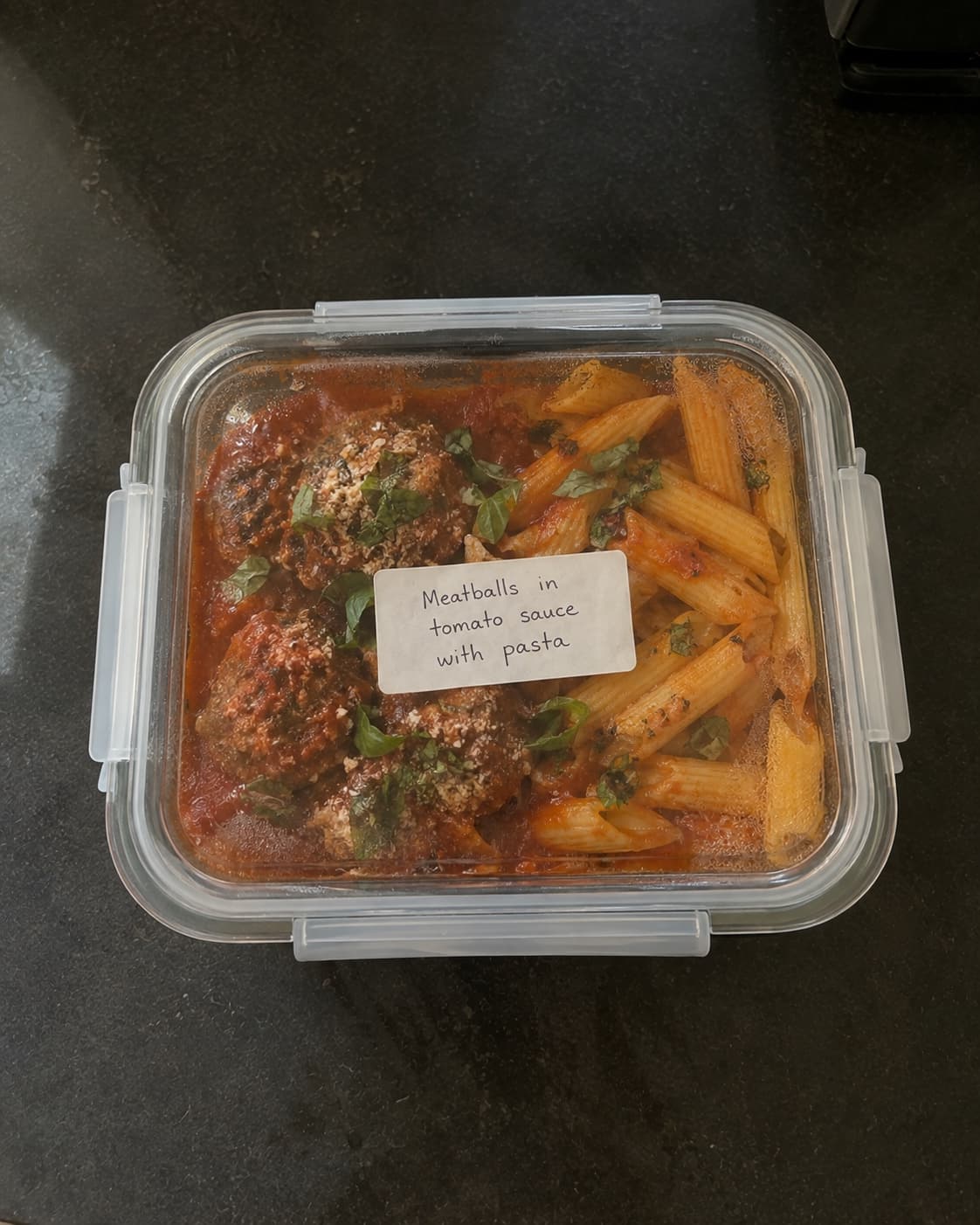 Meatballs in tomato sauce with pasta